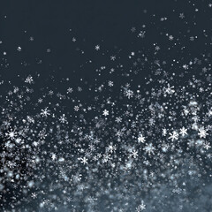 Obraz premium Delicate snowflakes gently falling against a dark blue winter background creating a peaceful seasonal atmosphere.