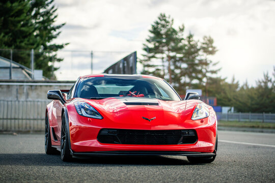 Brno, Czech Republic - October 24, 2025: Red Chevrolet Corvette, fast sports car parked outdoors.