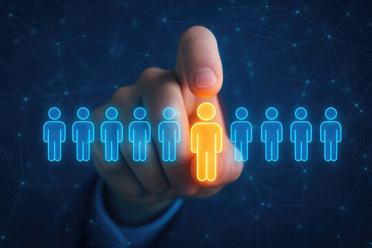Finger selecting a glowing orange person icon from a line of blue human icons on a digital network background