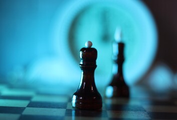 chess pieces king and queen on the chess board