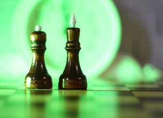 chess pieces king and queen on the chess board