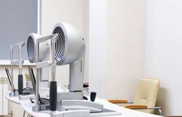 Modern ophthalmological equipment in the doctor's office. Diagnosis of eye diseases. Concept: ophthalmology, vision health, vision diagnostics, medicine of the future.