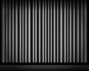 Obraz premium Abstract background featuring a pattern of grey vertical lines with a gradient that darkens to black at the edges, creating a pleated effect reminiscent of a closed stage curtain.