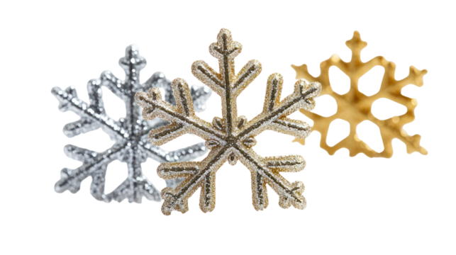 Three decorative snowflakes in silver gold and bronze isolated on transparent background