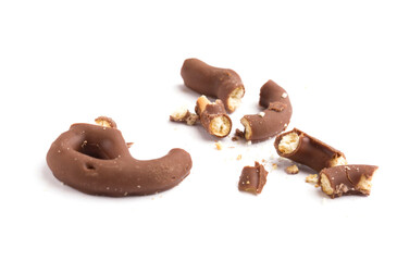 Chocolate pretzel crumbs on a white background