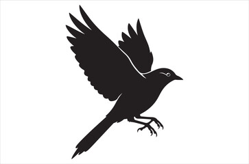 Obraz premium A striking silhouette of a bird in mid flight wings fully extended