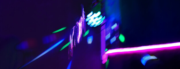 Blurred illuminated, multicolored. Disco Lights in the night, Night Club. Dance Party. Glitter Background. Multi-colored spotlight beam, Set of flashing lights