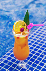 Beautiful cocktail by the pool. Selective focus.