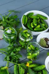 Preserving cucumbers in jars. Selective focus.
