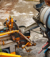 Concrete Pouring from Mixer Truck into Pump Hopper 