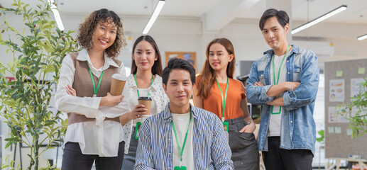 diverse inclusive team stands confidently together in a sustainable workplace symbolizing unity, equality, and purpose. Their collaboration reflects a forward-thinking business culture that values 