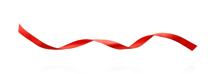 Red satin ribbon forming elegant wave like curves isolated on white background with clipping path. Design element Christmas gift wrapping, festive decorations, Valentines Day, weddings, birthdays.