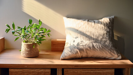 Linen Pillow Beside Wooden Bedside Table