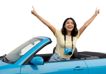Joyful woman with arms raised in convertible with camera