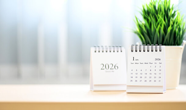 Minimal Desk with 2026 Calendar and Empty Space for Text &mdash; New Year Concept