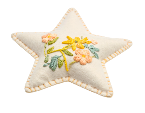 White felt star ornament with embroidered floral design and orange trim