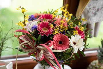 Colorful bouquet of flower with green plant with decoration. Elegant flowers for occasion or event. close up.