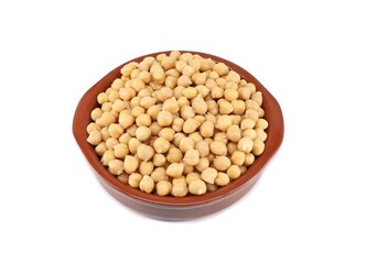 Boiled chickpeas in a clay serving bowl on white background.
