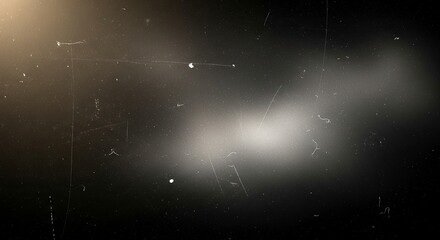 Ethereal abstract background with soft glowing light and subtle dust particles creating a dreamy and atmospheric textured overlay effect