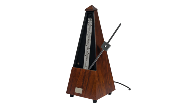 Wood metronome, swinging pendulum, black backdrop, instrument