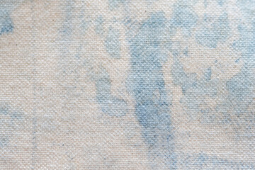 藍染液でムラができたアートな柄のキャンバス生地背景素材