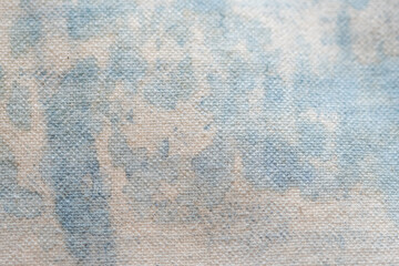藍染液でムラができたアートな柄のキャンバス生地背景素材
