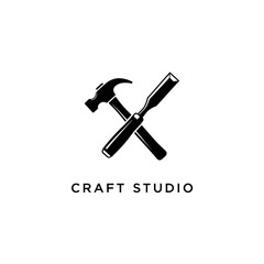 Craft Studio Logo Featuring Hammer and Chisel in a Crossed Design.