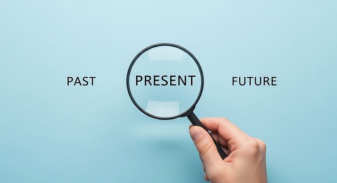 Magnifying glass focusing on the present between past and future on blue