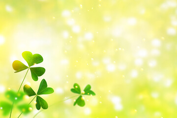 Fototapeta premium Green clover leaves on a background summer landscape. St.Patrick 's Day. Card.