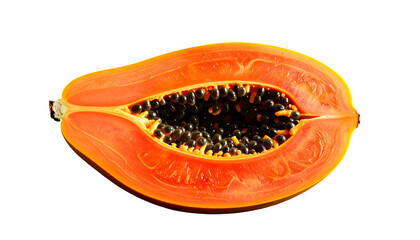 Sliced papaya reveals orange flesh and black seeds on black background