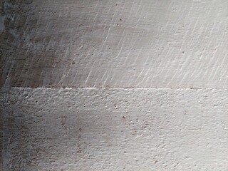 Old rustic white wooden plank texture. Bright light grunge wood surface with weathered and peeling paint. Scratched vintage wooden surface background.
