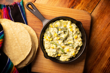 Rajas con Crema. Very popular dish in Mexico that consists of strips of poblano chili with cream, it is served as a garnish or in tacos, it is a typical recipe in Mexican Tacos de Guisado.