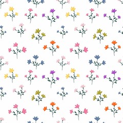 Seamless floral pattern with small colorful wildflowers on white background, cute botanical design for fabric, wallpaper, wrapping paper, and stationery.