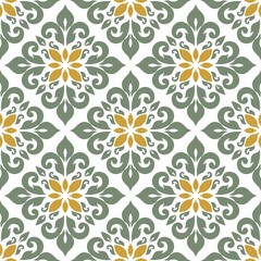  Seamless floral pattern with green and yellow ornamental motifs on white background, elegant vintage design perfect for wallpaper, fabric, and home decoration. 