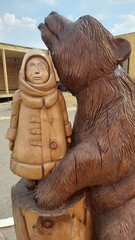 Wooden sculpture "Masha and the Bear" in the village of Srostki, Altai Territory