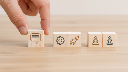 Concept of business success and strategy illustrated with wooden blocks