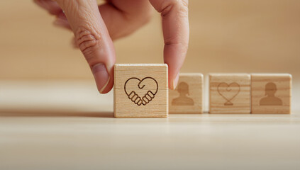Wooden blocks showing support partnership and community engagement concept
