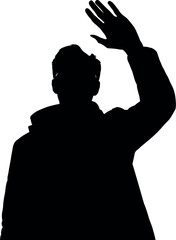 Silhouette of a man waving his hand in the air.