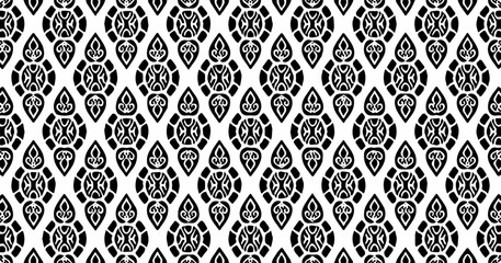 Black and white seamless pattern with small diamond motifs creating an elegant vintage ornamental background.