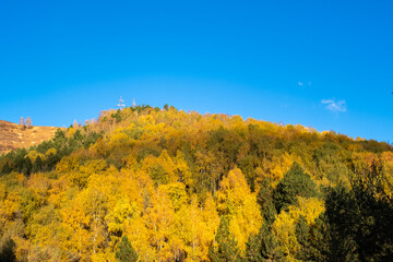 Fototapeta premium Autumn landscape in the mountains at sunset near Almaty, Kazakhstan.