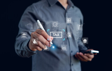 Businessman analyzing financial data and tax report with digital interface. Concept for finance, accounting, taxation, investment, and digital business management.