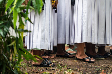 Nuns and members of the Christian community pray during a religious service