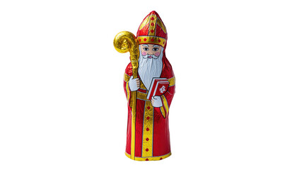 A chocolate saint nicholas figure wrapped in red and gold foil on a black background stands upright