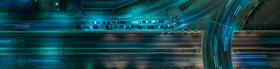 Expressway, Self-driving autonomous electric cars of the future with HUD elements move along a busy traffic intersection. Concept: Artificial Intelligence, Car Scan, GPS Tracking, Smart Roads, IoT