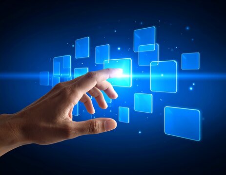 Hand touching glowing digital interface with blue holographic screens and data points