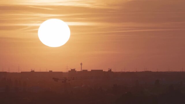 Timelapse of the sun setting over the Berlin city skyline