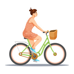Fototapeta premium Woman with brown hair in bun pedaling green bicycle with basket, wearing pink dress and sneakers, on white background. Vector illustration