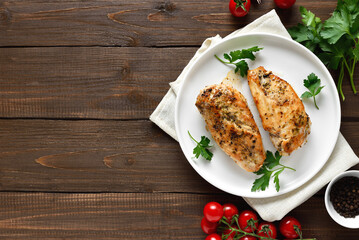 Roasted chicken breast on plate