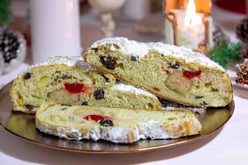 Traditional German Christmas Stollen Slices with Marzipan and Dried Fruits