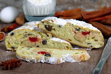 Traditional German Christmas Stollen Slices with Marzipan and Dried Fruits